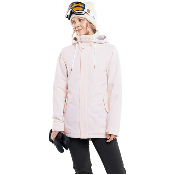 Volcom Women's Fawn Insulated Jacket 2024 - A light pink jacket with a hood, worn by a model in front of a white background.