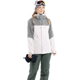 Volcom Women's Bolt Insulated Jacket - A grey, white, and black jacket with a hood, zippered pockets, and a snap-button closure.