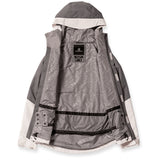 Volcom Women's Bolt Insulated Jacket 2024 - A grey and white jacket with a hood, featuring a black zipper on the front.
