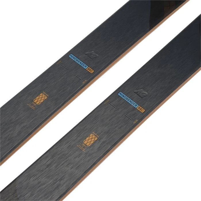 K2 Mindbender 96C skis 2024 feature a dark gray design with white graphics.