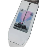 Burton Women's Story Board Snowboard 2025 - A white snowboard with a pink and blue graphic of a woman riding it down a mountain.