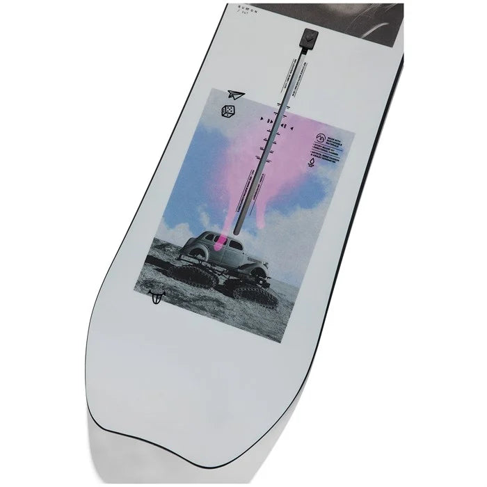 Burton Women's Story Board Snowboard 2025 - A white snowboard with a pink and blue graphic of a woman riding it down a mountain.