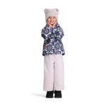 Obermeyer Junior's Ashor Insulated Jacket - A young girl wearing a blue and white floral patterned jacket with pink accents, paired with light-colored pants and a gray hat.