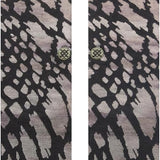 REPTILIOUS CREW SOCK 2024 - A pair of crew socks with a reptile skin pattern in shades of brown and tan.