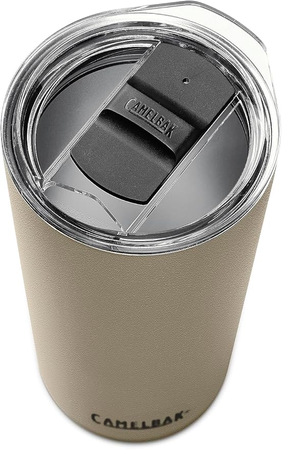 CamelBak Horizon Tumbler 20 Oz 2022 - A tan tumbler with a black lid and a small hole in its center.
