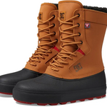 DC Reach Insulated Water Resistant Boot 2024 - A pair of tan boots with black soles and red accents, featuring a DC logo on the side.