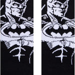 THE BATMAN KIDS CREW SOCK 2022 - A pair of black crew socks with a white Batman logo on the top.