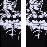 THE BATMAN KIDS CREW SOCK 2022 - A pair of black crew socks with a white Batman logo on the top.