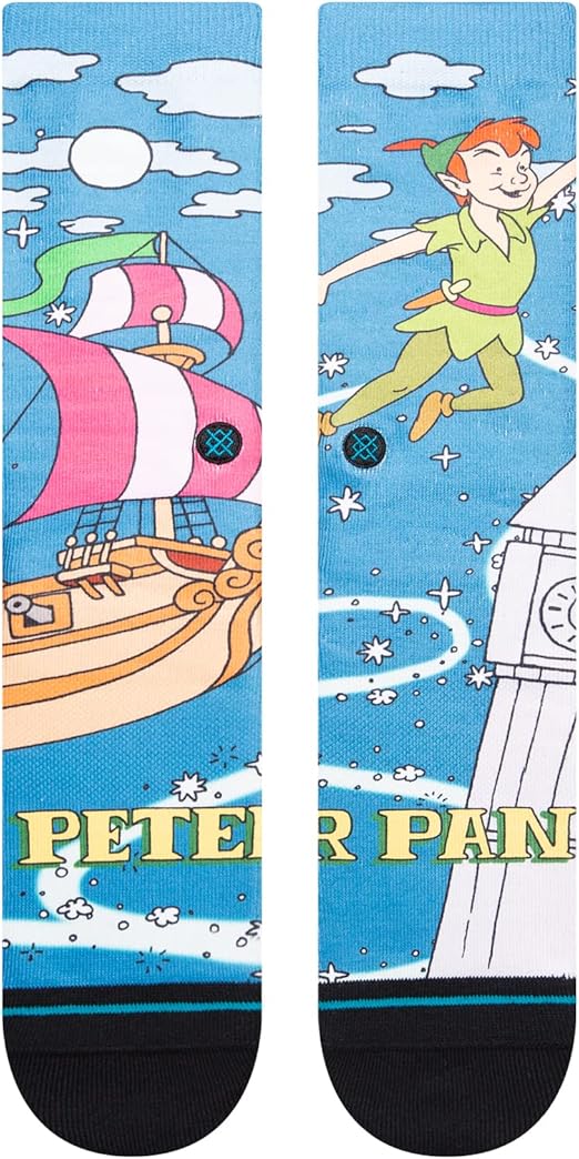 PETER PAN BY TRAVIS C SOCK 2023 - A pair of socks featuring Peter Pan flying above a city skyline at night, with a full moon in the sky and stars scattered throughout.