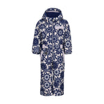 Obermeyer Junior's Quinn Insulated One-Piece Suit 2025 - A navy blue snowsuit with a white floral pattern and a hood, featuring a zipper down the front.