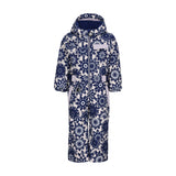 Obermeyer Junior's Quinn Insulated One-Piece Suit 2025 - A navy blue snowsuit with a white floral pattern and a hood, featuring a zipper down the front.