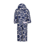 Obermeyer Junior's Quinn Insulated One-Piece Suit 2025 - A white snowsuit with a navy floral pattern and a hood, featuring two gray stripes on each sleeve.