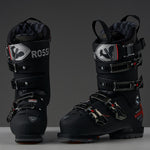 Rossignol Hi-Speed Pro Carbon 130 Ski Boots 2024 - Black ski boots with silver buckles and a carbon fiber pattern on the side.