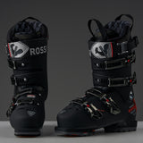 Rossignol Hi-Speed Pro Carbon 130 Ski Boots 2024 - Black ski boots with silver buckles and a carbon fiber pattern on the side.