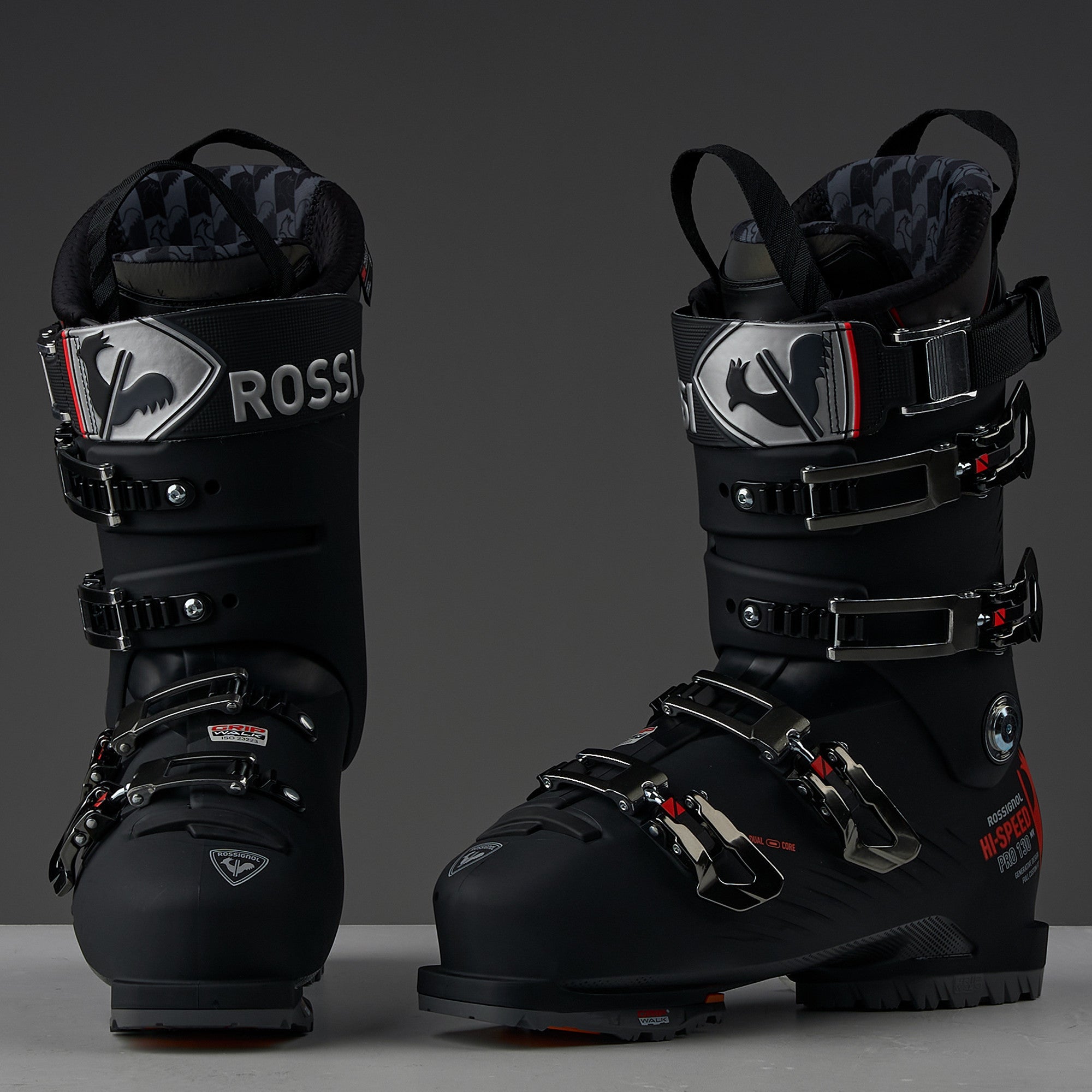 Rossignol Hi-Speed Pro Carbon 130 Ski Boots 2024 - Black ski boots with silver buckles and a carbon fiber pattern on the side.