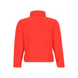 Obermeyer Junior's Ultra Gear Zip Top 2025 - A coral-colored zip-up top with a high collar and long sleeves, featuring a small embroidered logo on the left chest area.
