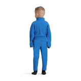 Obermeyer Junior's Ultra Gear Pant 2025 - A royal blue fleece pant with a white logo on the left leg, worn by a young boy facing away from the camera.