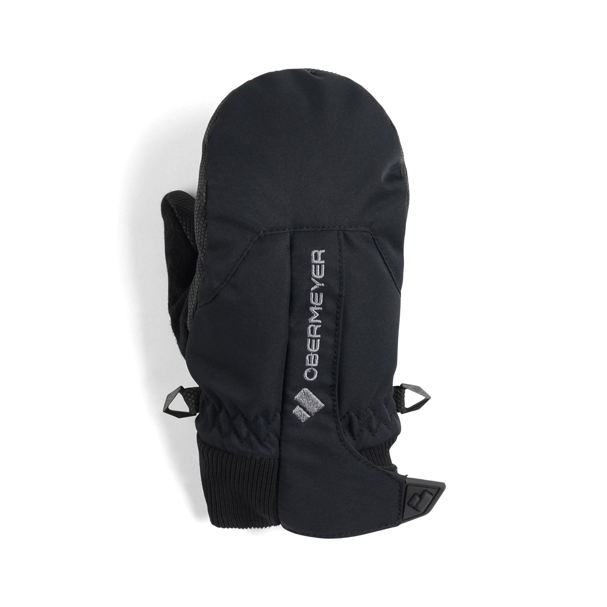 Obermeyer Junior's Thumbs Up Mitten 2025 - A black mitten with a white logo on the cuff and a strap that goes between the thumb and index finger.