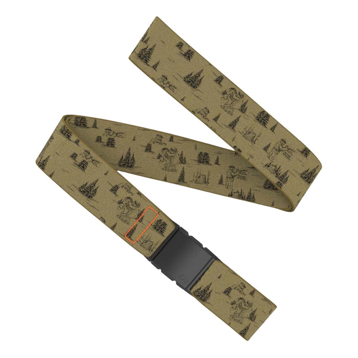 An olive-green fabric belt with a pattern featuring black illustrations of trees and people engaged in outdoor activities. The belt is folded in a crisscross pattern and has a rectangular black plastic buckle. The word 'ARCADE' is visible near the end, highlighted with an orange outline.