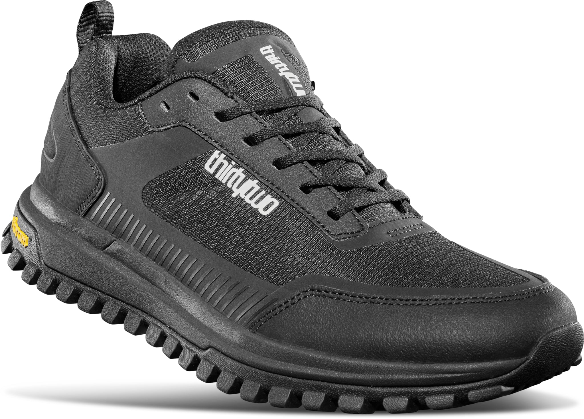 ThirtyTwo Hiker Shoe 2025 - A black shoe with a textured sole and white lettering on the side.
