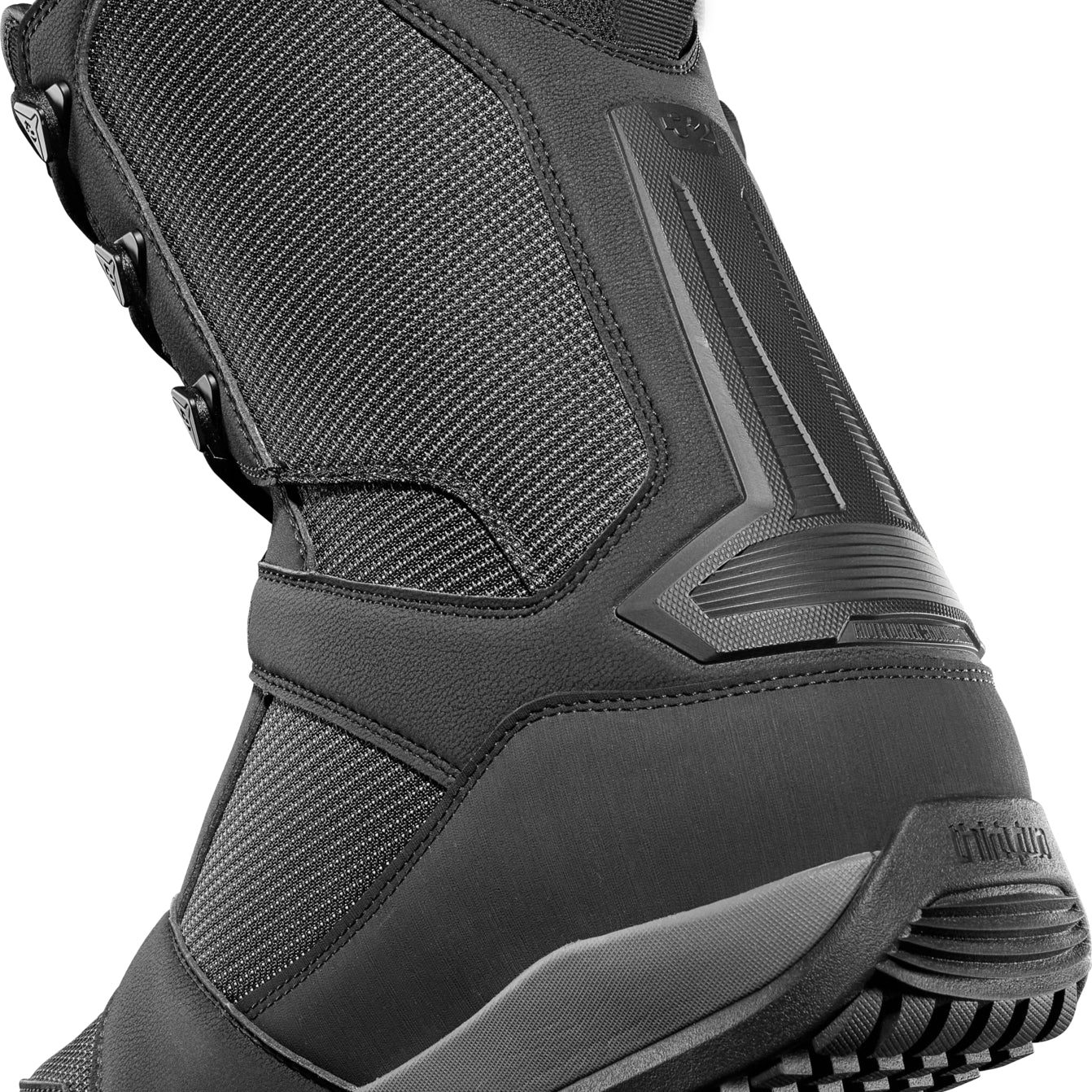 ThirtyTwo Diesel Hybrid Snowboard Boot 2025 - A black snowboard boot with a textured pattern on the side and a strap at the top.