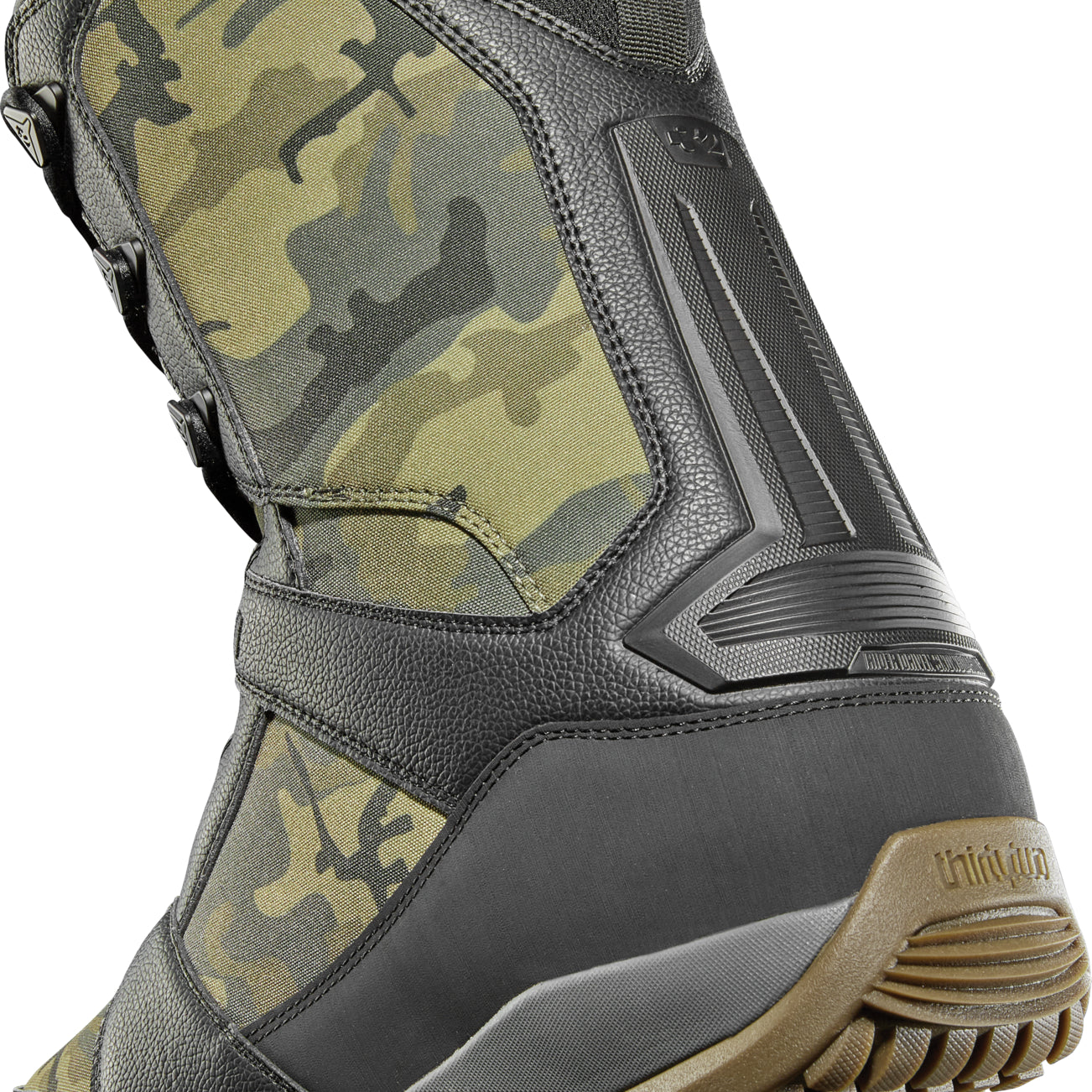 ThirtyTwo Diesel Hybrid Snowboard Boot 2025 - A black snowboard boot with a camouflage pattern on the side and a brown sole.