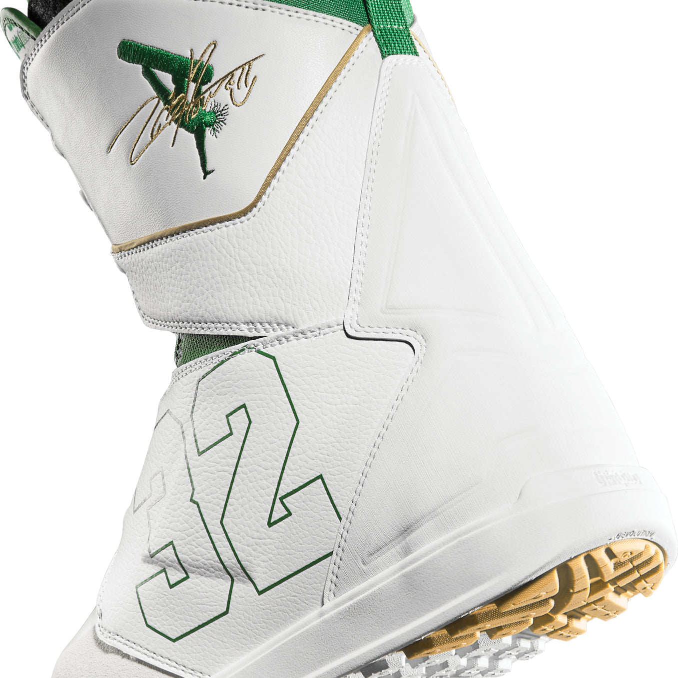 ThirtyTwo Lashed Double BOA x Powell Snowboard Boot 2025 - A white snowboard boot with green accents and a gold logo on the side.