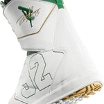 ThirtyTwo Lashed Double BOA x Powell Snowboard Boot 2025 - A white snowboard boot with green accents and a gold logo on the side.