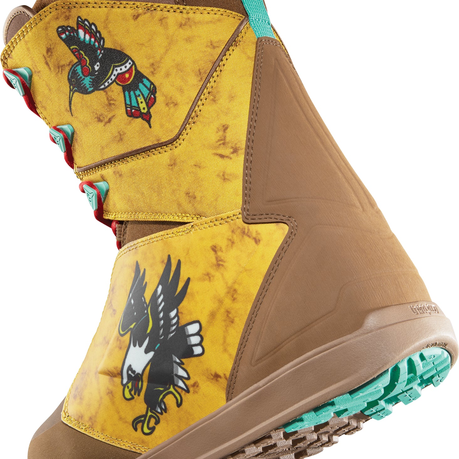 ThirtyTwo Lashed X Fava Snowboard Boot 2025 - A tan snowboard boot with a black and white bird graphic on the side, featuring teal laces and red accents.