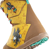 ThirtyTwo Lashed X Fava Snowboard Boot 2025 - A tan snowboard boot with a black and white bird graphic on the side, featuring teal laces and red accents.