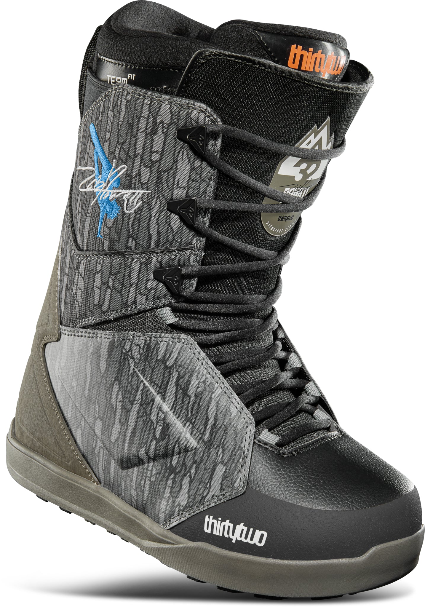 ThirtyTwo Lashed x Powell Snowboard Boot 2025 - A black and white snowboard boot with a blue logo on the side, featuring a textured pattern.