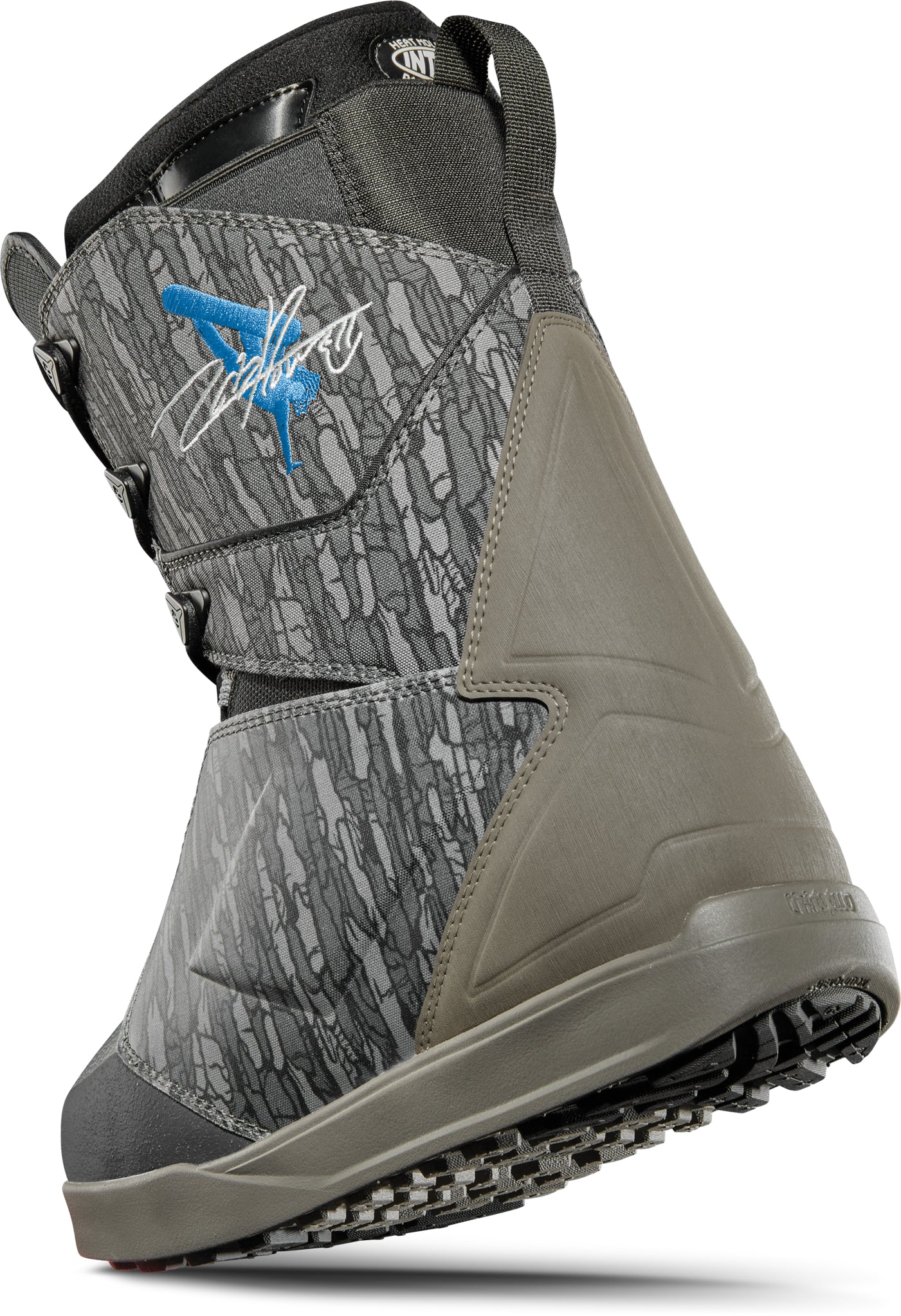 ThirtyTwo Lashed x Powell Snowboard Boot 2025 - A gray snowboard boot with a blue logo featuring a white outline of a lashed strap and the word "Lashed" in cursive script.
