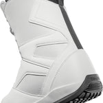 ThirtyTwo STW Double BOA Snowboard Boot 2025 - A white snowboard boot with a black strap and logo on top, featuring a textured pattern on the side.