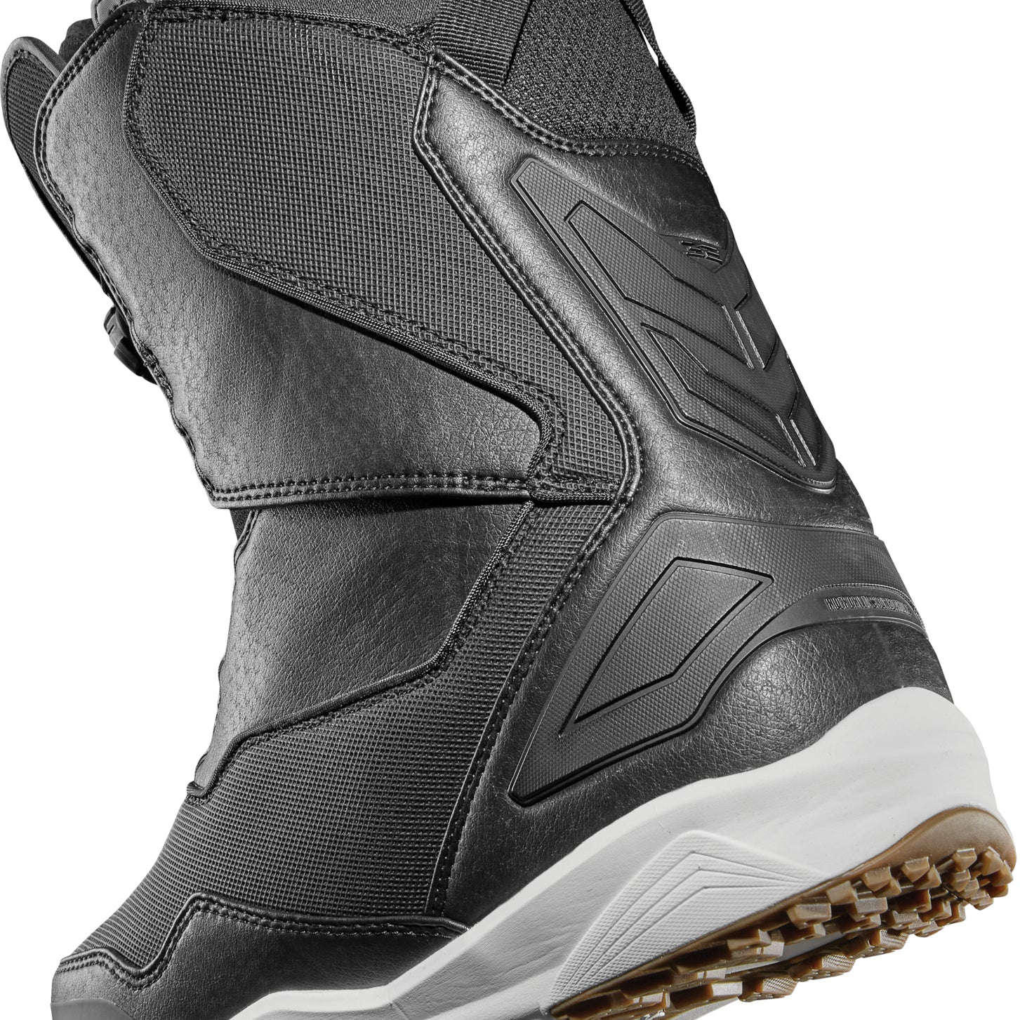 ThirtyTwo TM-2 Double BOA Snowboard Boot 2025 - A black snowboard boot with a textured pattern on the side and a white sole.