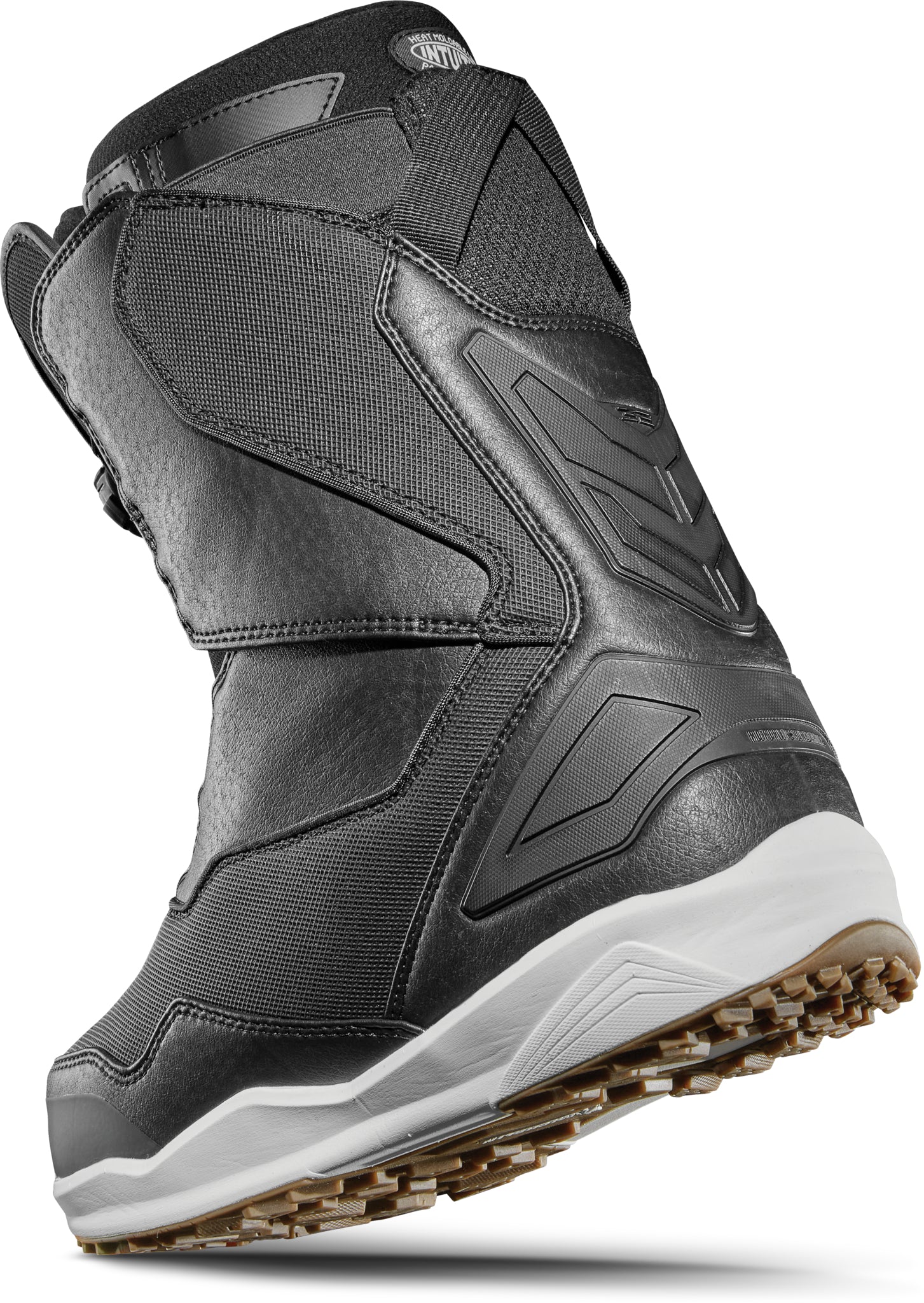 ThirtyTwo TM-2 Double BOA Snowboard Boot 2025 - A black snowboard boot with a textured pattern on the side and a white sole.