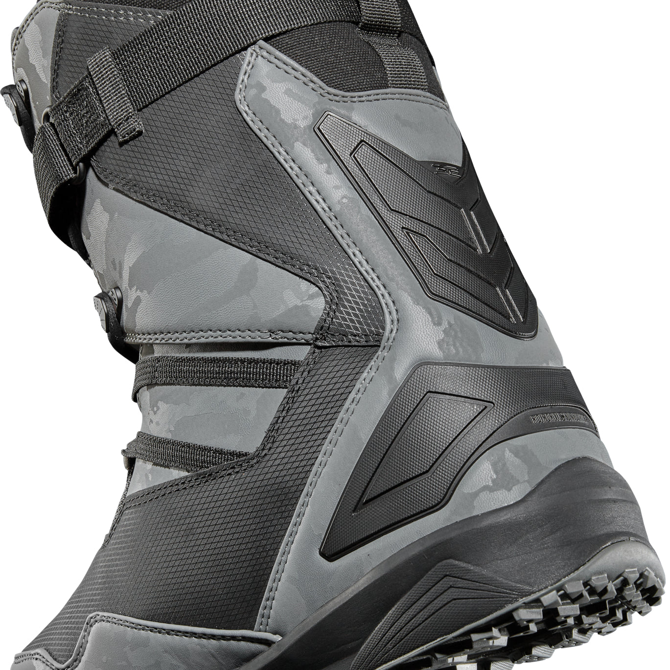 ThirtyTwo TM-2 XLT X Diggers Snowboard Boot 2025 - A black and grey snowboard boot with a camouflage pattern on the side, featuring a strap across the top.