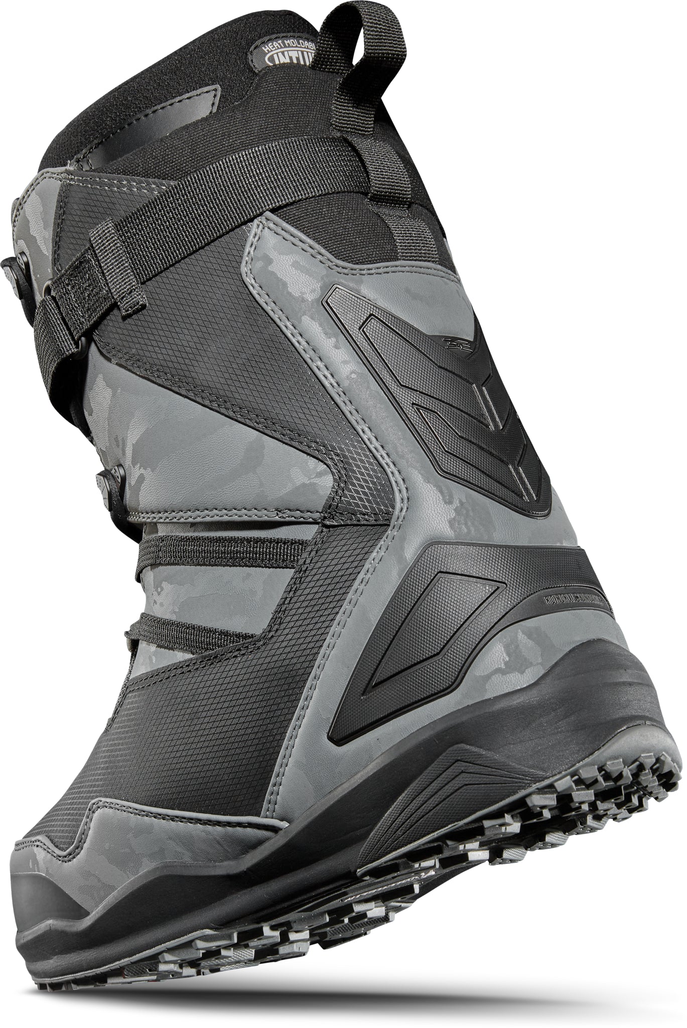 ThirtyTwo TM-2 XLT X Diggers Snowboard Boot 2025 - A black and grey snowboard boot with a camouflage pattern on the side, featuring a strap across the top.