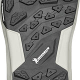 ThirtyTwo TM-2 XLT X Helgason Snowboard Boot 2025 - A black snowboard boot with a white logo on the side and a silver buckle.