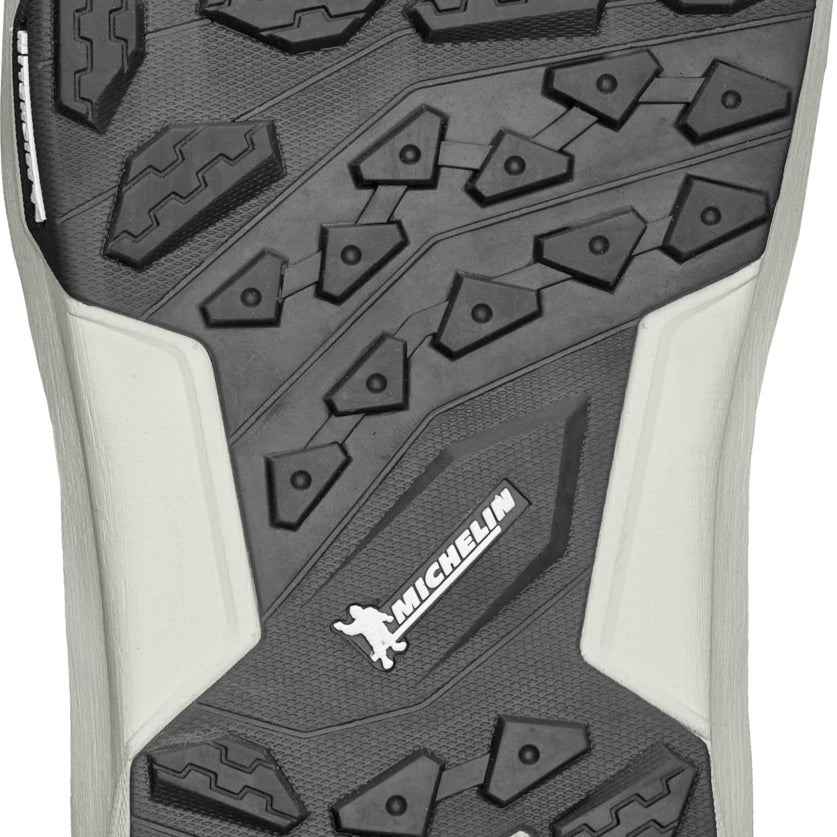 ThirtyTwo TM-2 XLT X Helgason Snowboard Boot 2025 - A black snowboard boot with a white logo on the side and a silver buckle.