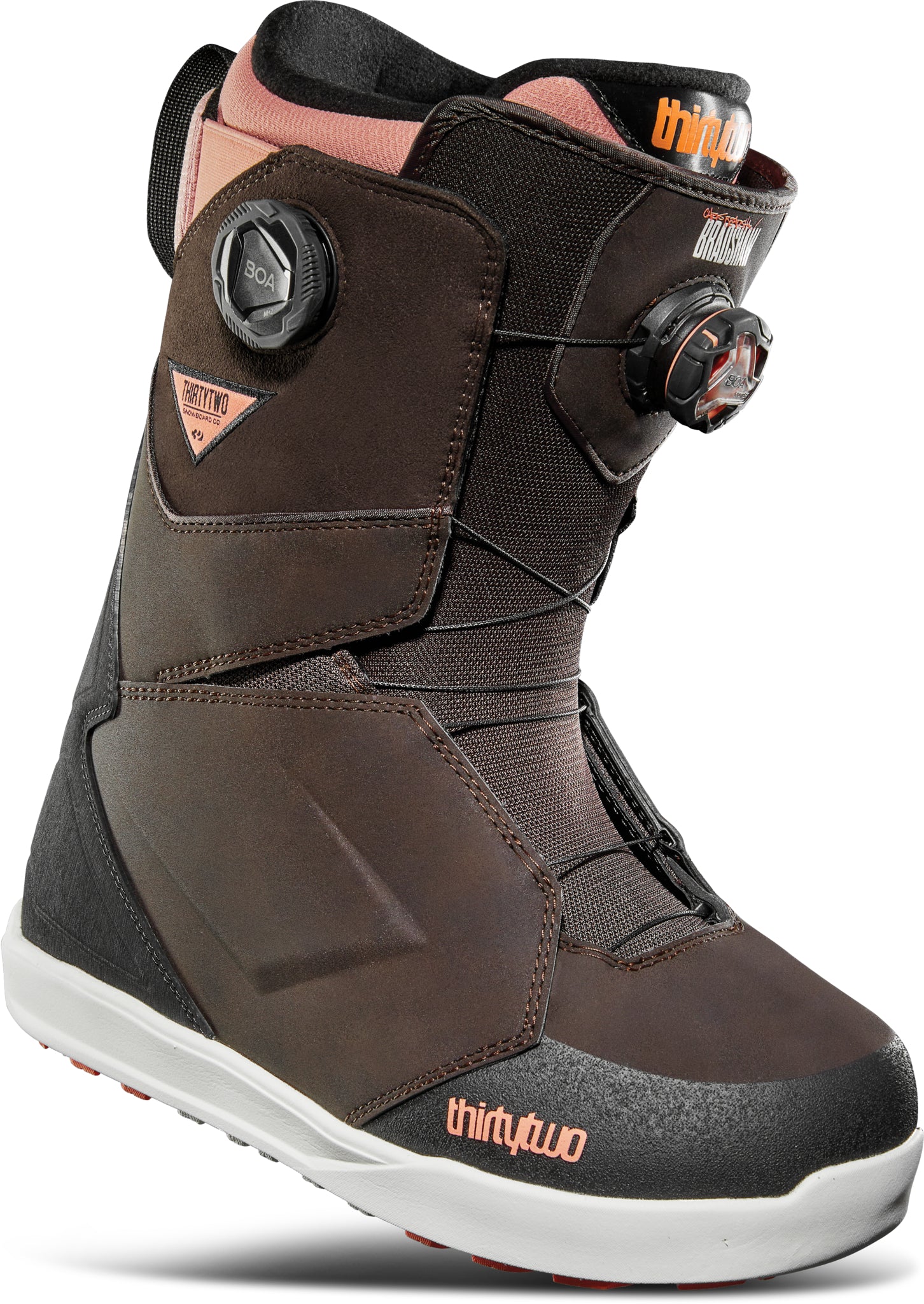 ThirtyTwo Lashed Double BOA Wide Snowboard Boot 2025 - A brown snowboard boot with a pink lining and black laces, featuring two circular BOA dials on either side of the ankle.