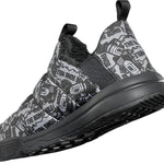 ThirtyTwo The Lounger X Bomb Hole Shoe 2024 - Black shoe with white and grey graphic print featuring a cartoon bomb hole character.