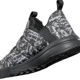 ThirtyTwo The Lounger X Bomb Hole Shoe 2024 - Black shoe with white and grey graphic print featuring a cartoon bomb hole character.