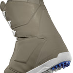 ThirtyTwo Lashed Premium X Spring Break Snowboard Boot 2025 - A tan snowboard boot with a white sole and blue accents on the bottom of the sole.