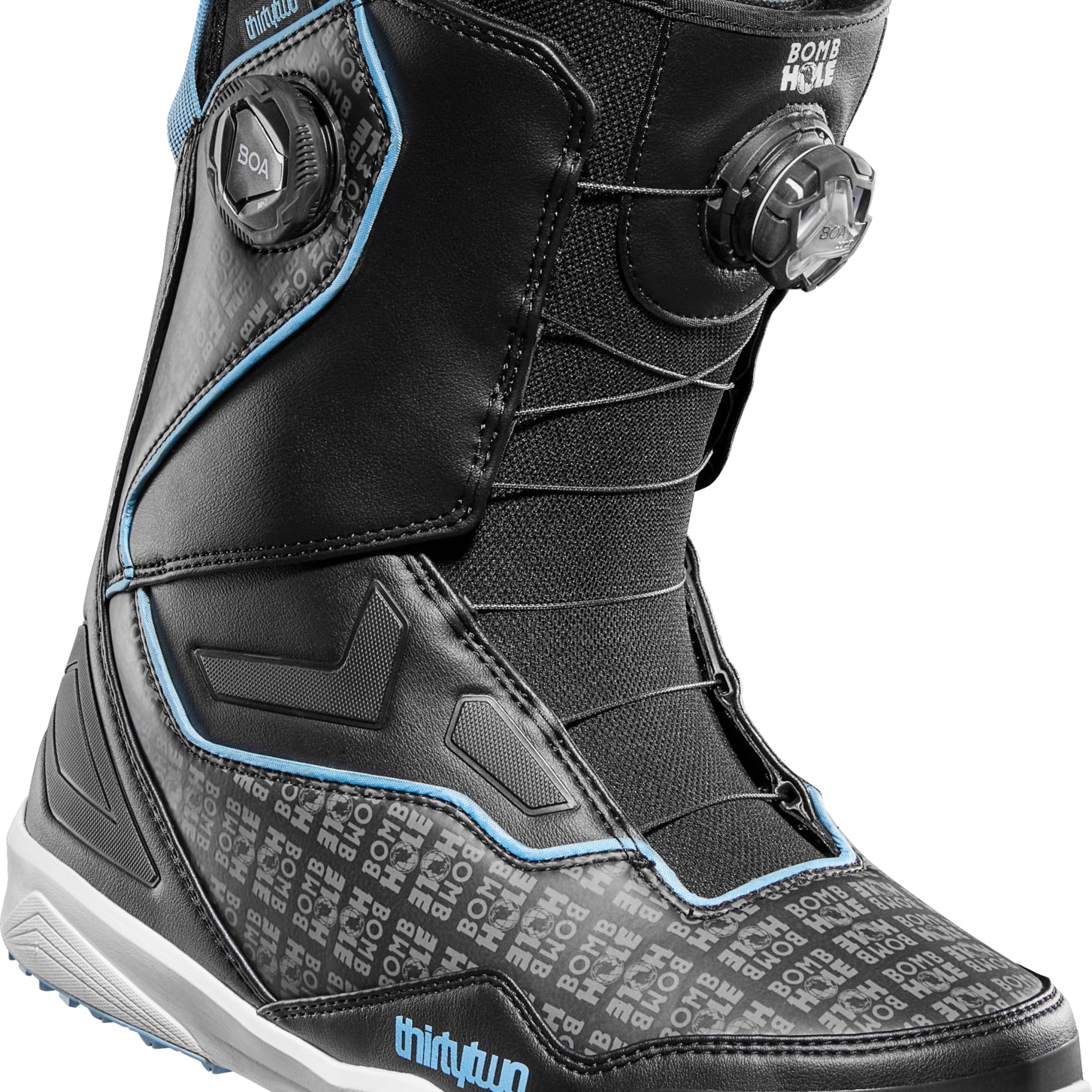 ThirtyTwo TM-2 Double BOA X Bomb Hole Snowboard Boot 2025 - Black snowboard boots with white accents and a repeating "Bomb Hole" pattern on the toe box.