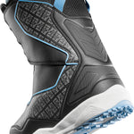 ThirtyTwo TM-2 Double BOA X Bomb Hole Snowboard Boot 2025 - Black snowboard boot with a textured pattern on the side and blue accents around the ankle strap.