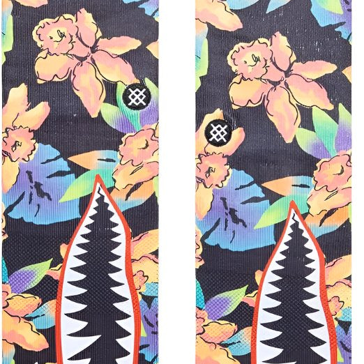 Stance Bomin Crew Sock 2024 - A pair of crew socks with a colorful floral pattern on a black background.