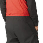 ThirtyTwo Spring Break x Powder Shell Bib 2024 - Black bib with white and red accents, featuring a palm tree design on the back.