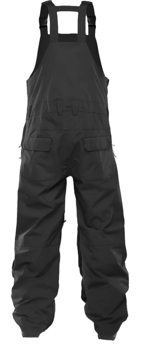 ThirtyTwo Basement Shell Bib Pant 2025 - Black bib pants with adjustable straps and zippered pockets.