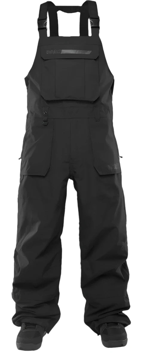ThirtyTwo Basement Shell Bib Pant 2025 - Black bib pant with adjustable straps and zippered leg openings.