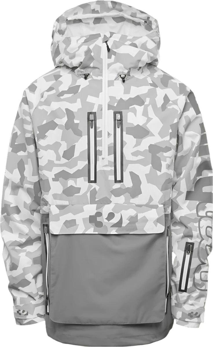 ThirtyTwo Light Shell Anorak Jacket 2025 - A light-colored jacket with a geometric pattern and zippered pockets.